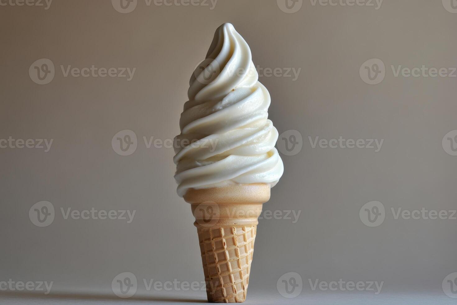 A Single Soft Serve Ice Cream Cone photo
