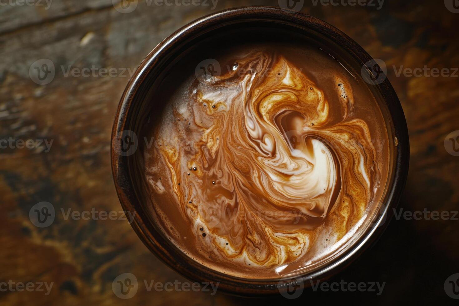 Swirled Cream in Dark Brown Hot Chocolate Drink photo