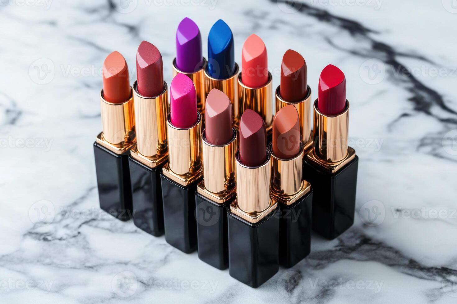 Array of Colorful Lipsticks on Marble Surface photo