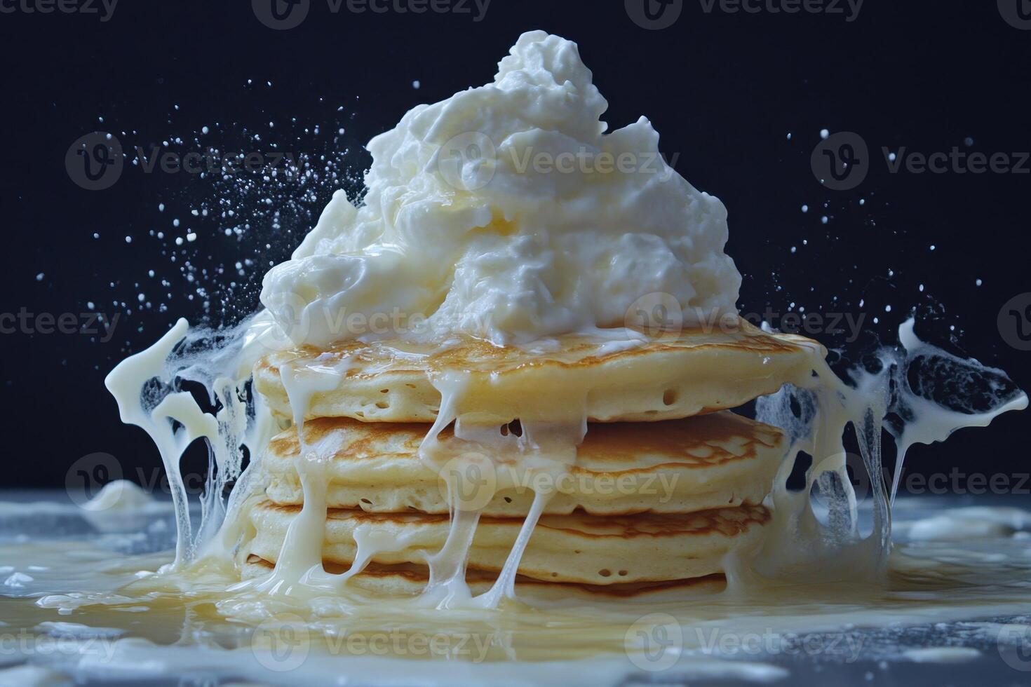 Delicious Pancakes Topped With Whipped Cream And Syrup photo