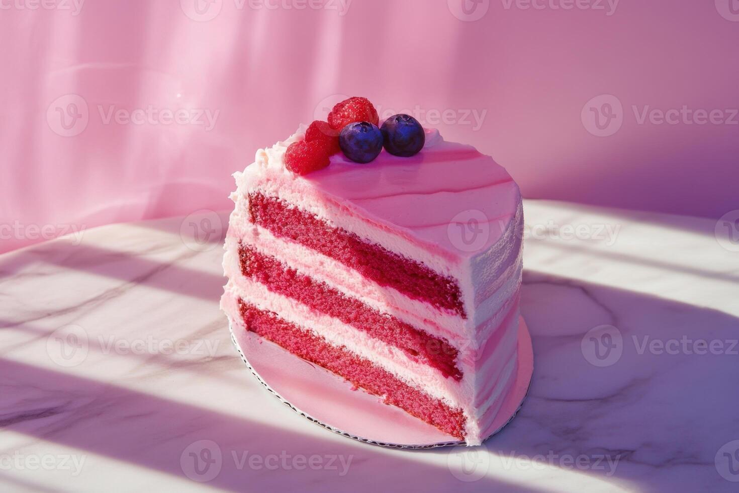Delicious Pink Raspberry Cake Slice With Berries photo