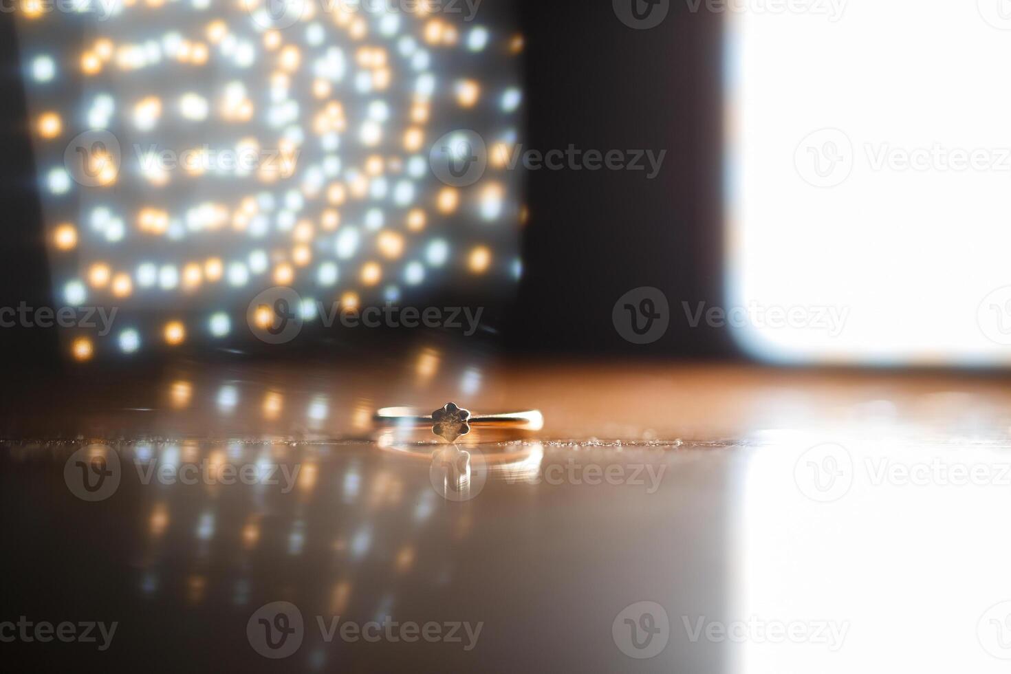 gold ring with a stone on the wedding day for the bride photo