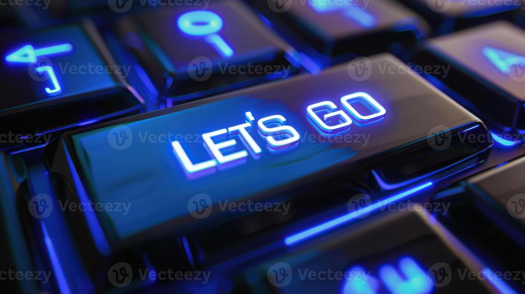 Close Up of Blue Illuminated Keyboard With Lets Go Key photo