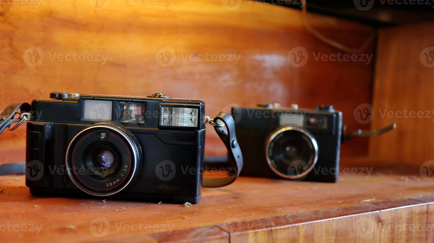 Retro Old camera stack of vintage books photo