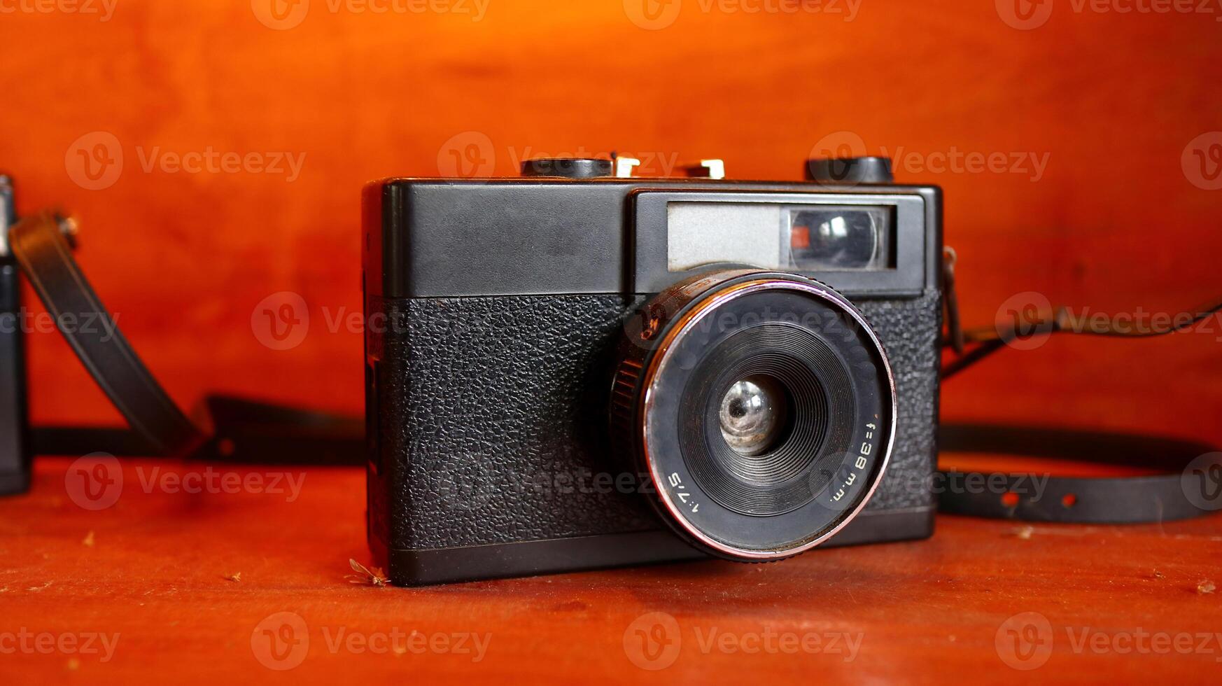 Retro Old camera stack of vintage books photo