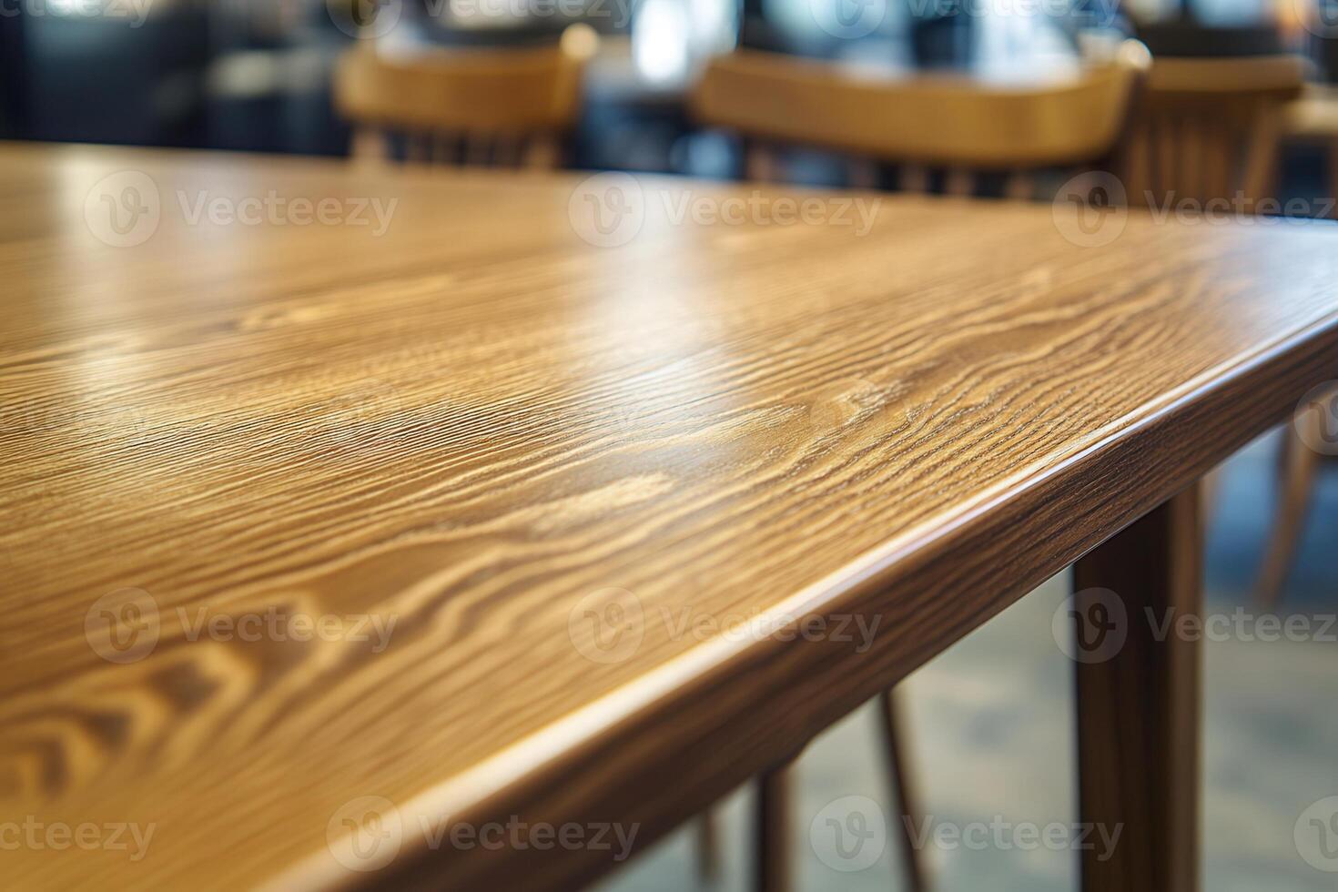 A table with wooden chairs and a wooden table photo