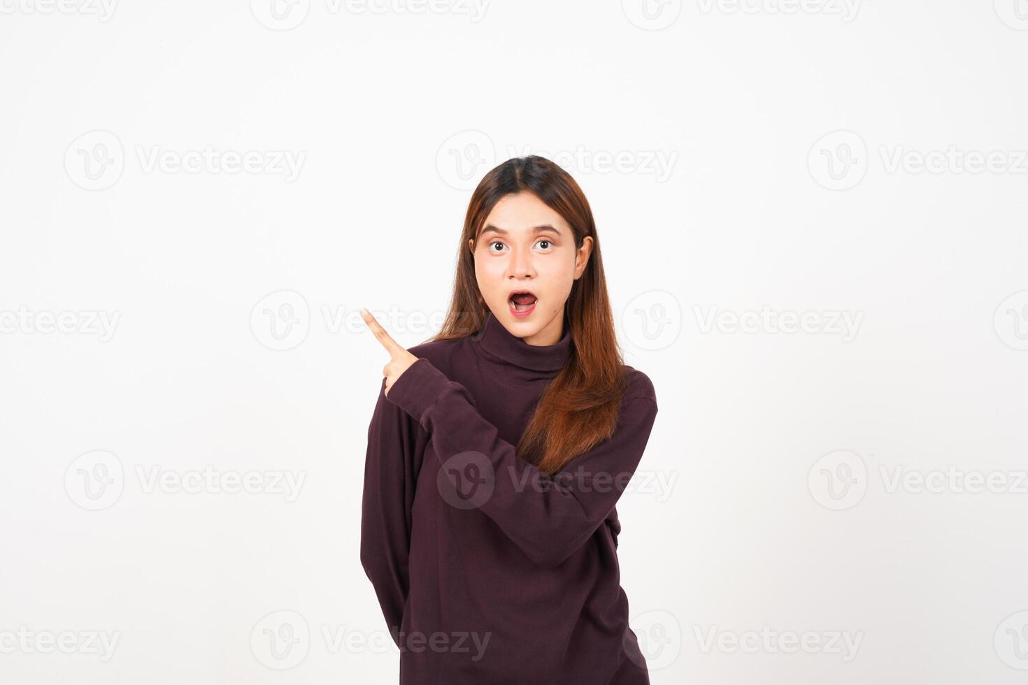 Wow Face Reaction, Presenting and Pointing aside copy space for advertising showing product Of Beautiful Asian Woman Isolated On White Background photo