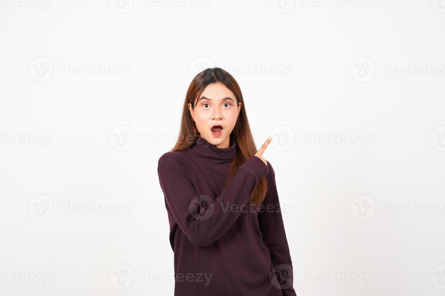 Wow Face Reaction, Presenting and Pointing aside copy space for advertising showing product Of Beautiful Asian Woman Isolated On White Background photo