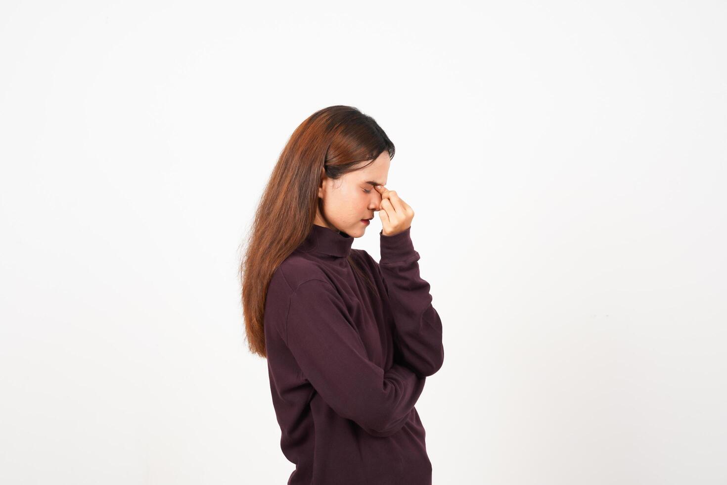 Rubbing nose feel pain on head, Suffering Headache Of Beautiful Asian Woman Isolated On White Background photo