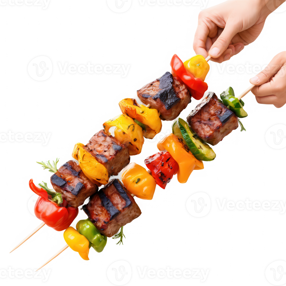 A person holding a skewer with meat and vegetables png