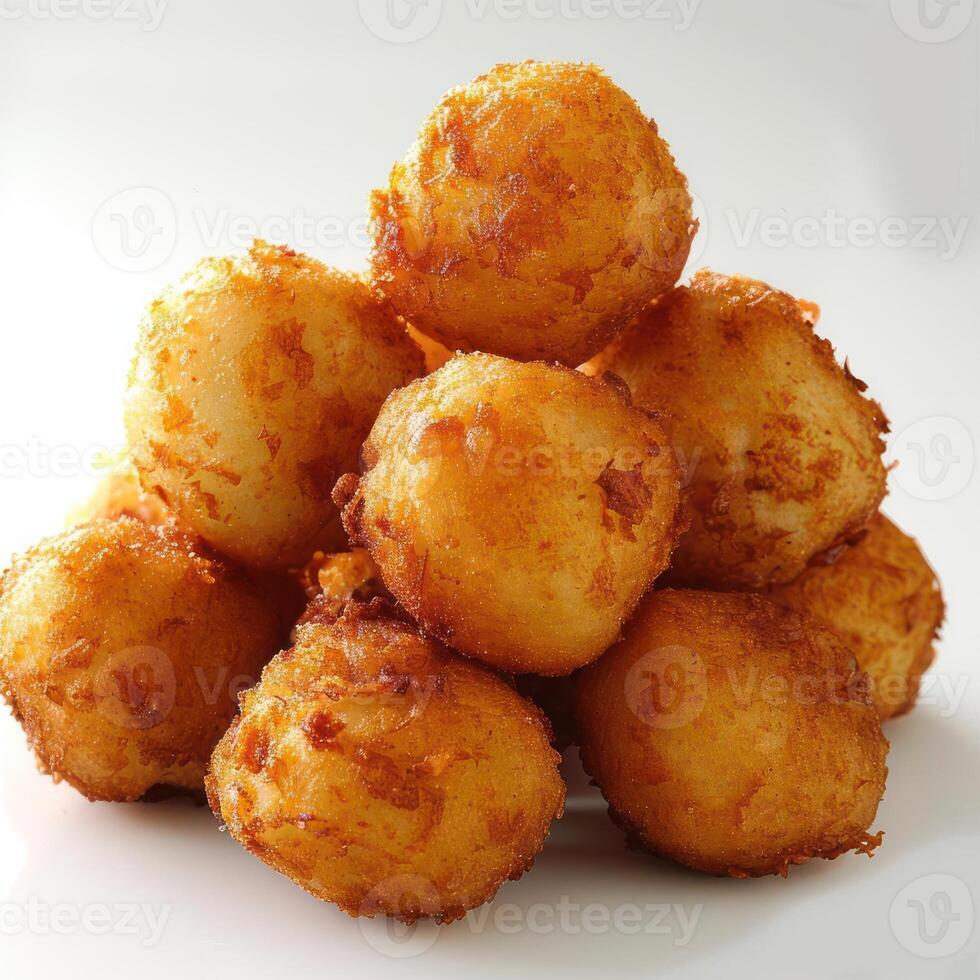 A bunch of sweet doughnuts topped with cinnamon sugar. photo