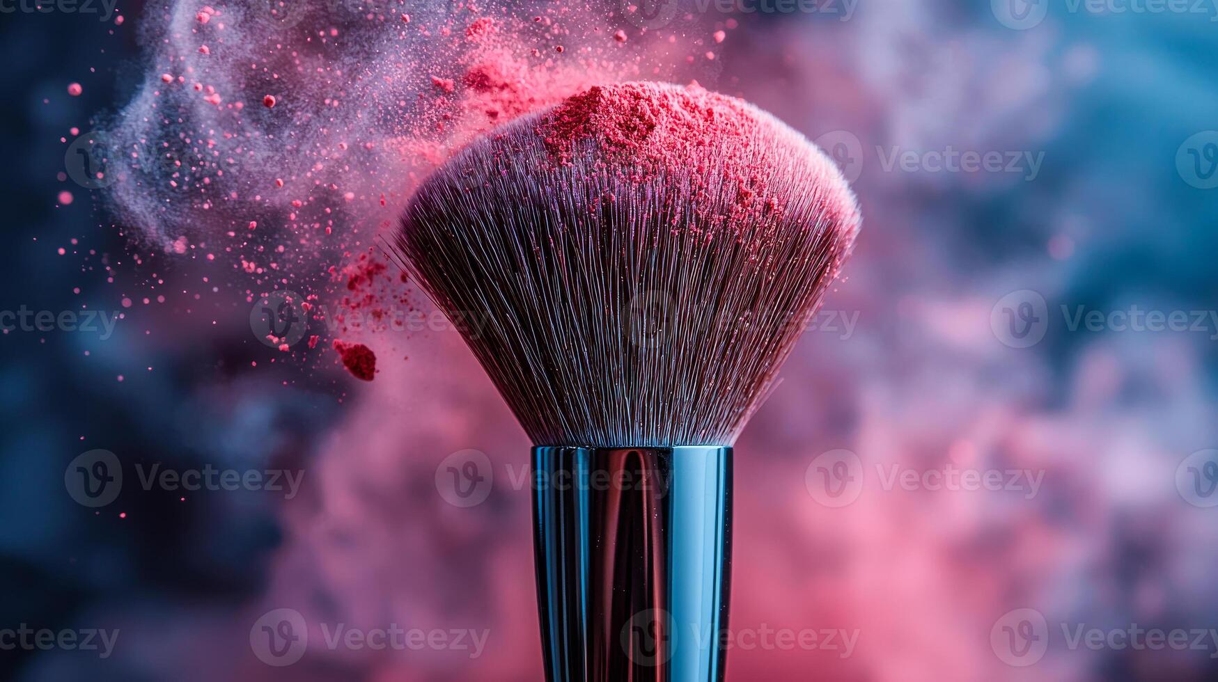 Makeup brush with vibrant blush powder in action. A close-up of a makeup brush releasing pink blush powder against a dark background, creating a colorful burst. photo