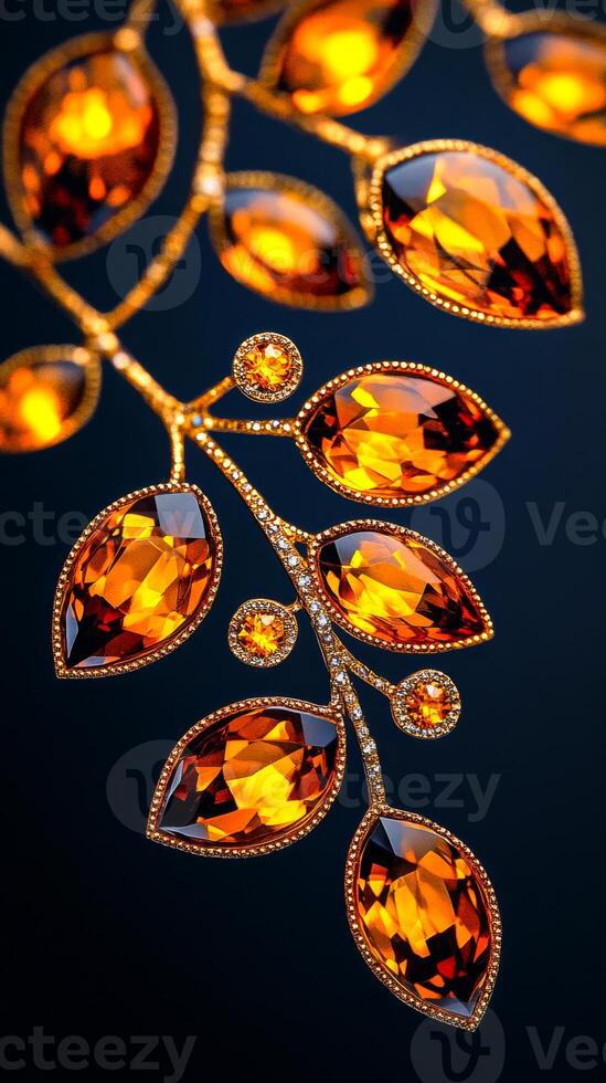 A close up of a gold leaf with many small brown stones. The leaf is surrounded by a dark background photo