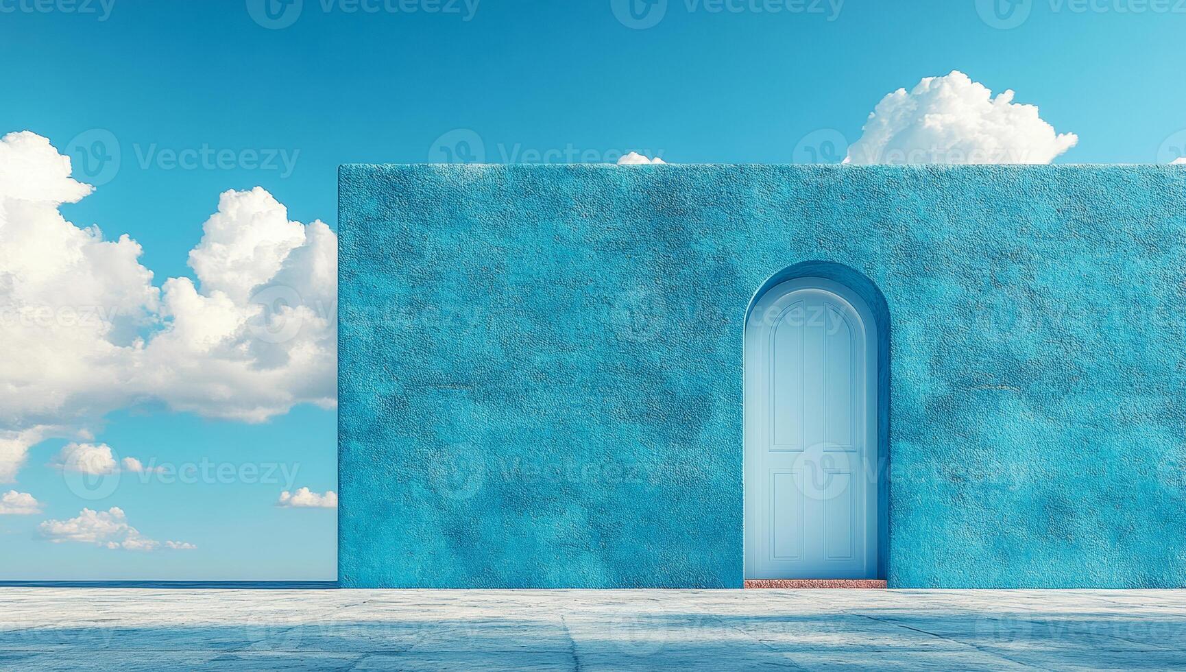 A blue building with a white door and a blue arch. The sky is blue and cloudy. The building is empty and the door is open photo