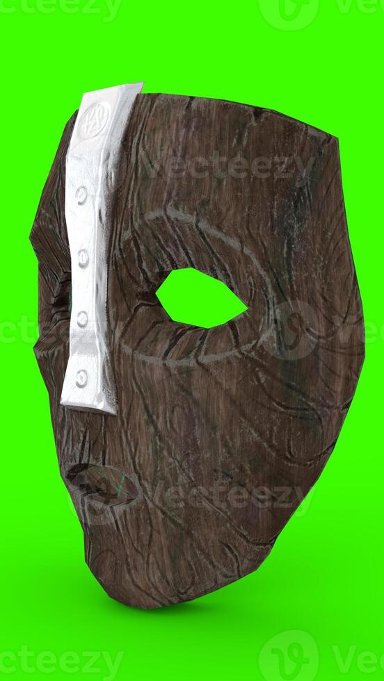 the wooden mask with green background photo