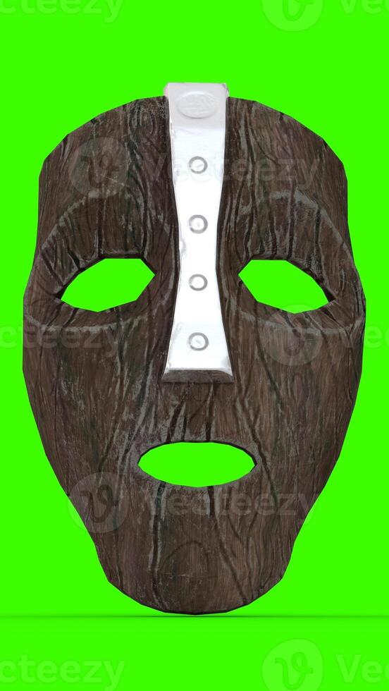 the wooden mask with green background photo
