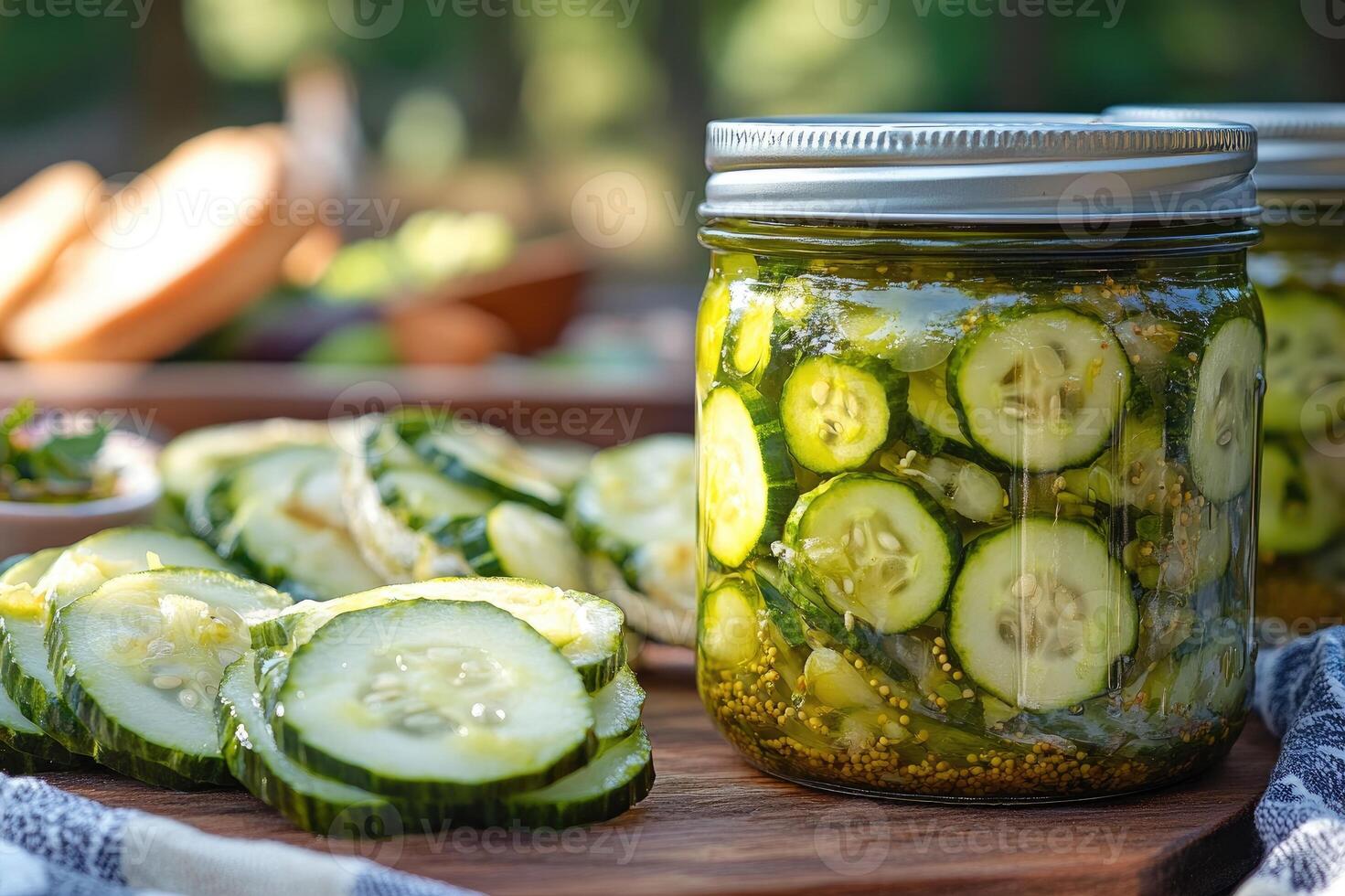 Preparing homemade pickles, slicing fresh cucumbers and canning for preservation photo