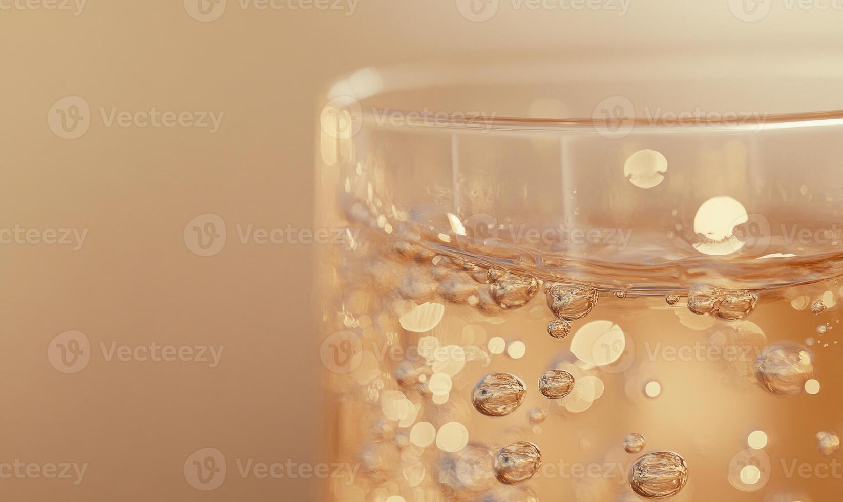 A glass of water with bubbles in it photo
