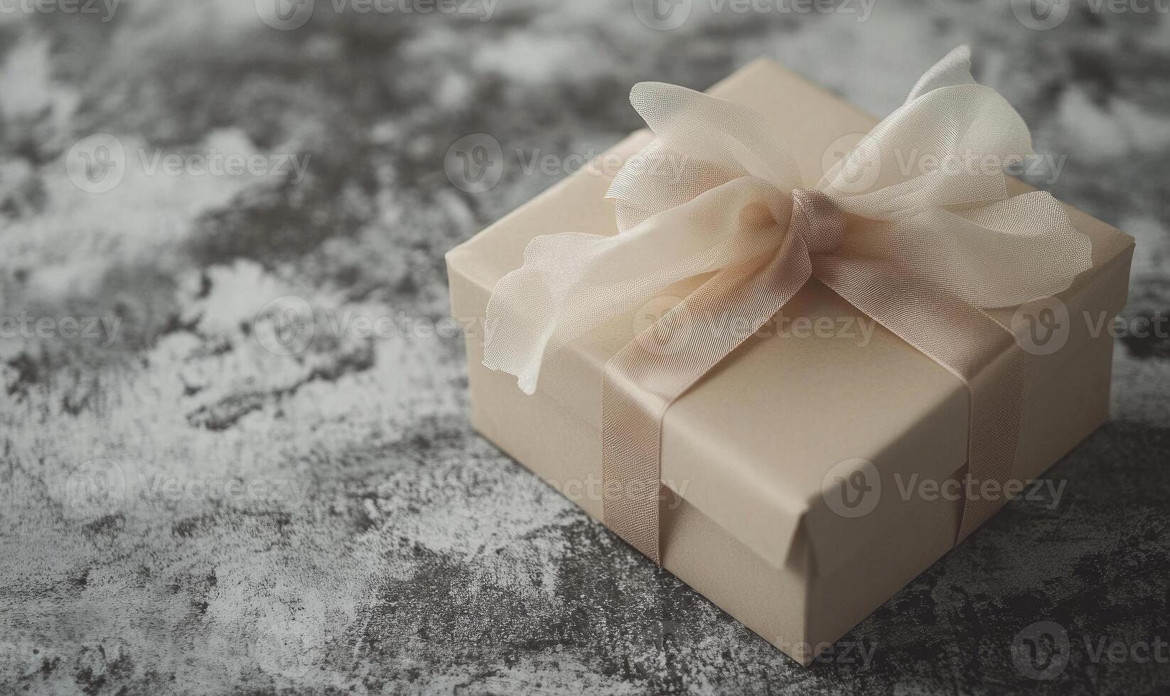 A brown box with a ribbon on top photo