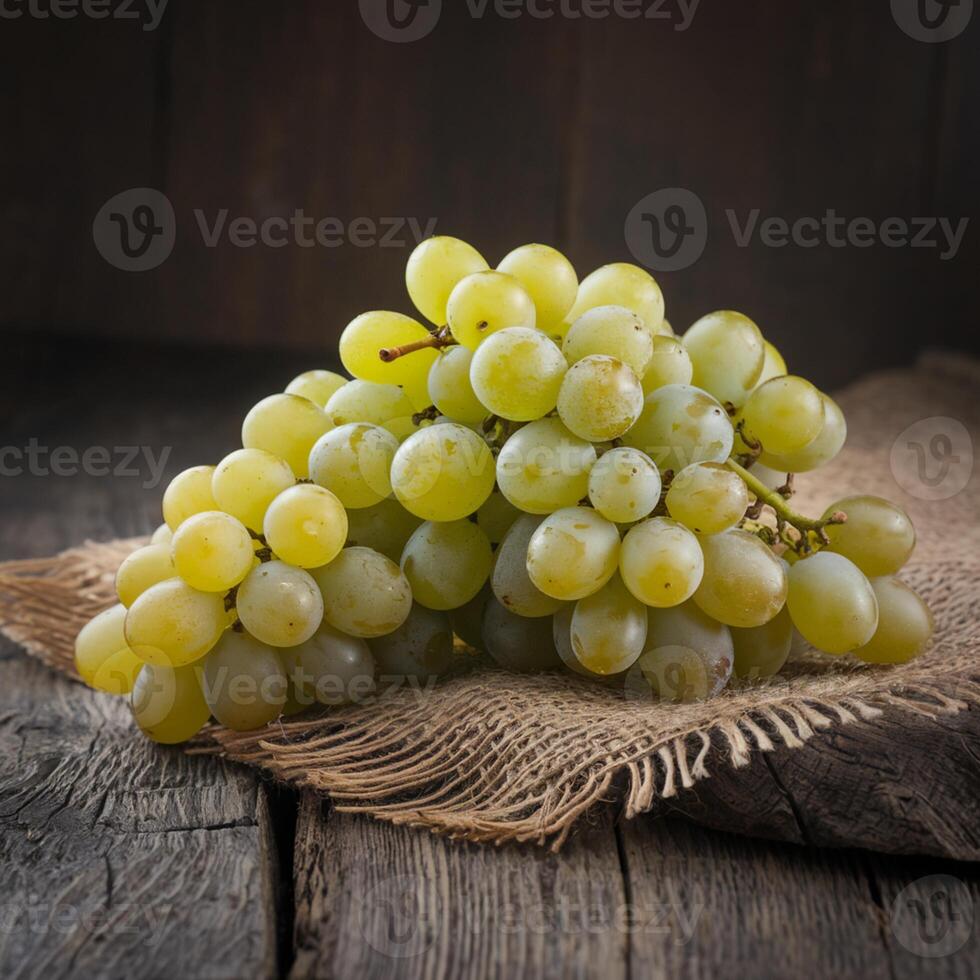Vibrant green grapes on rustic wooden surface, coarse burlap fabric, dark moody background For Social Media Post Size photo