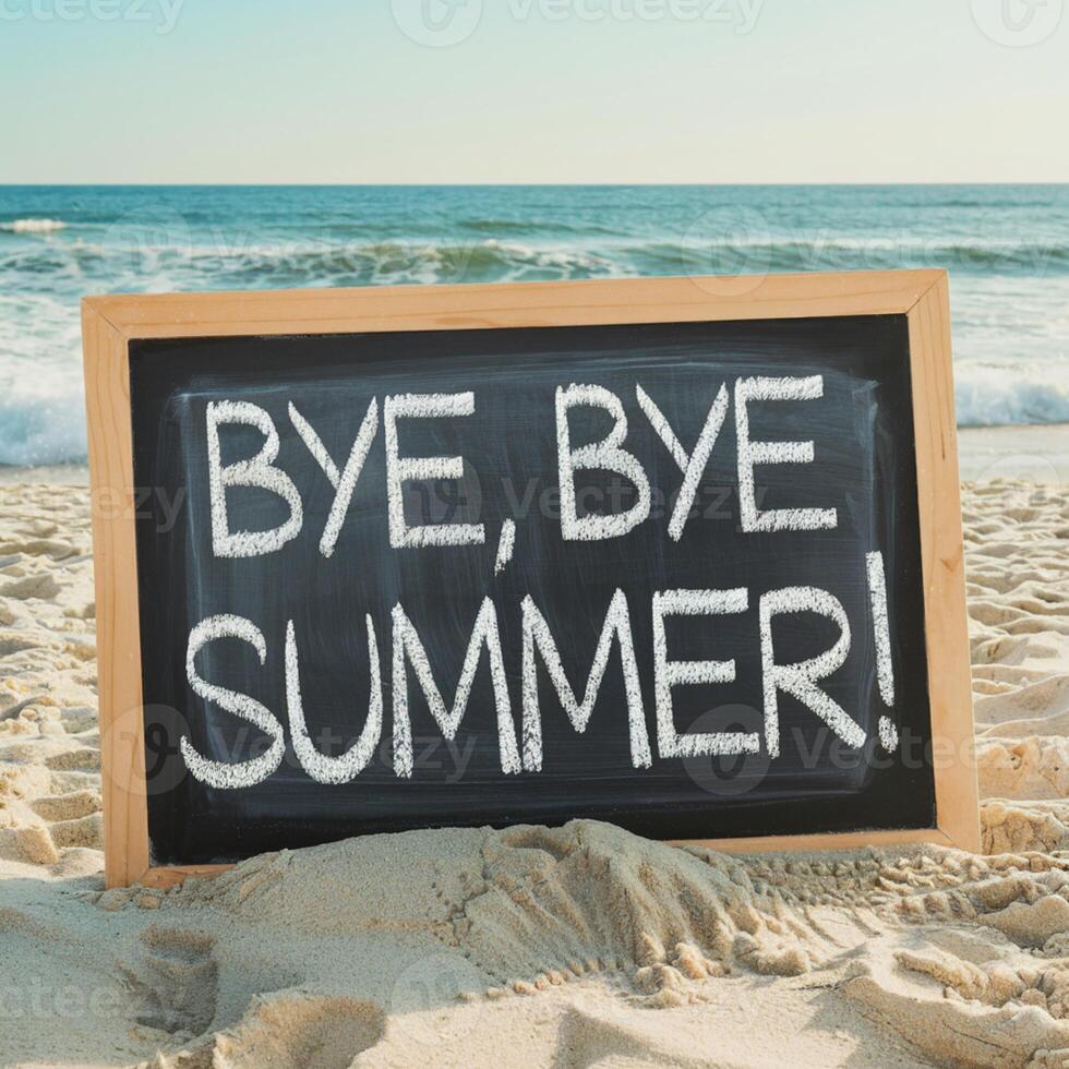 Chalkboard on sandy beach, ocean waves in background, BYE BYE SUMMER written For Social Media Post Size photo