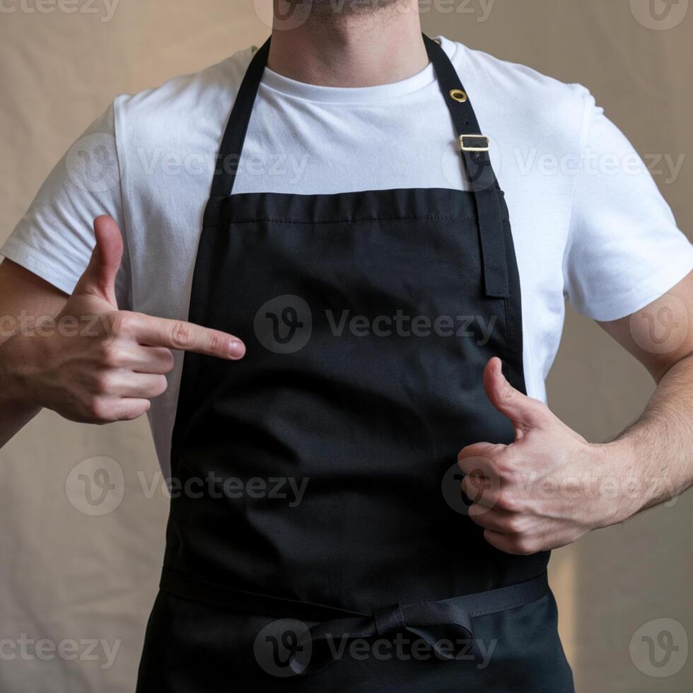 Person in white t shirt and apron giving a thumbs up, highlighting apron For Social Media Post Size photo