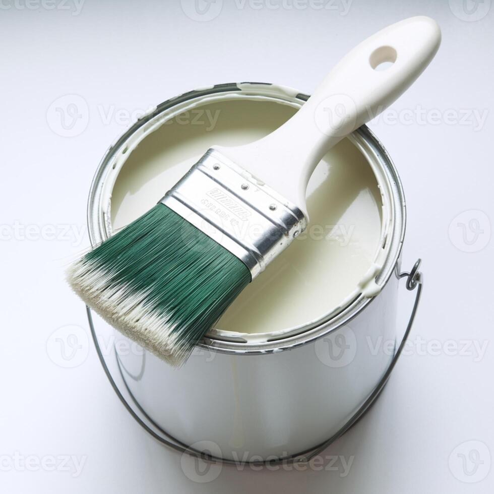 Paintbrush resting on white paint can, pristine white background highlights details For Social Media Post Size photo