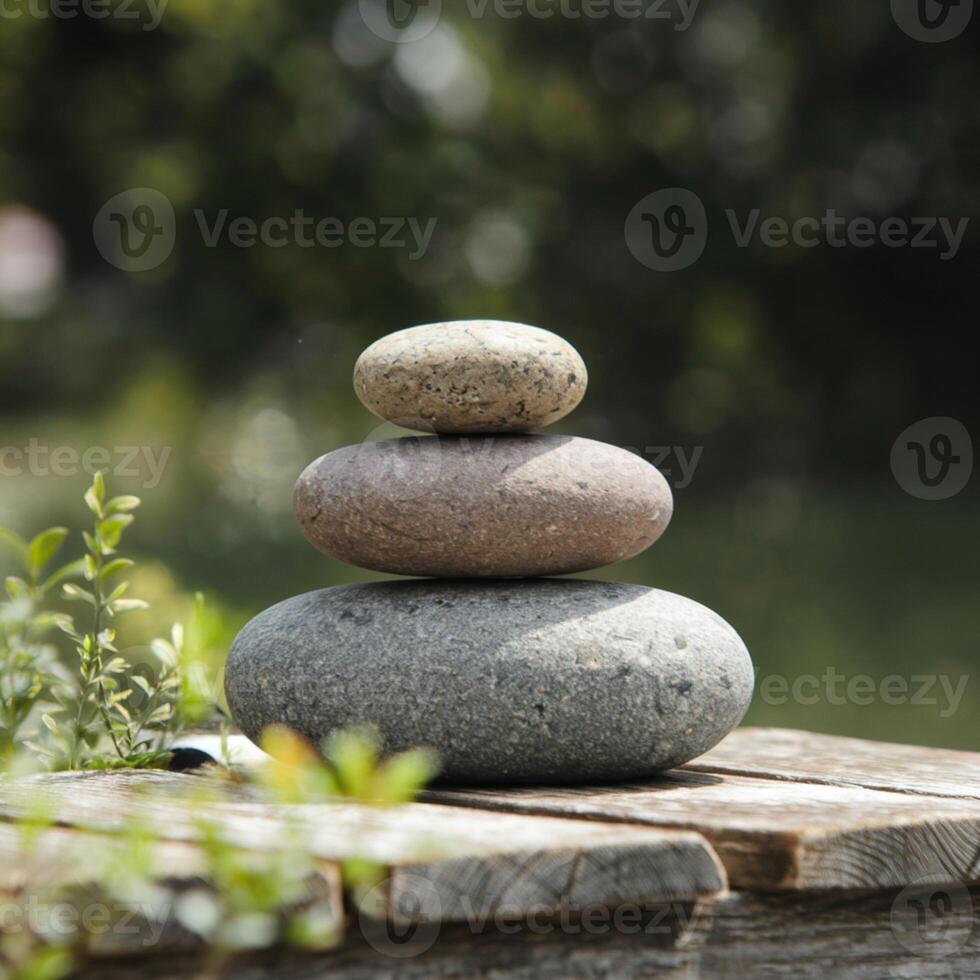 Three stacked stones on wooden surface, sunlight highlights textures, blurred green backdrop For Social Media Post Size photo