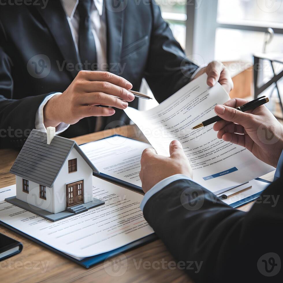 Office meeting, reviewing real estate documents, house model suggests formal consultation For Social Media Post Size photo
