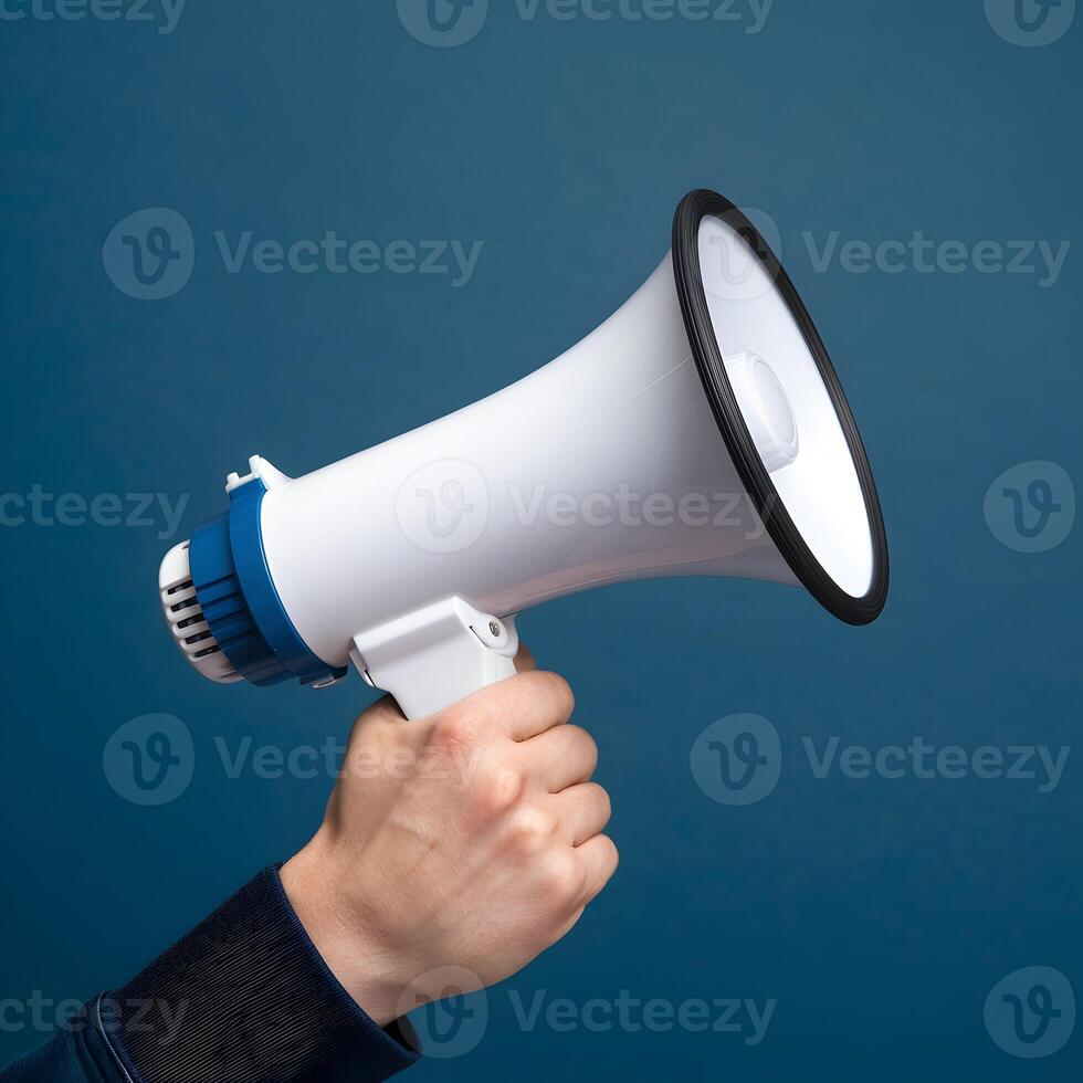 White megaphone with blue handle, side profile against blue background emphasizes communication For Social Media Post Size photo