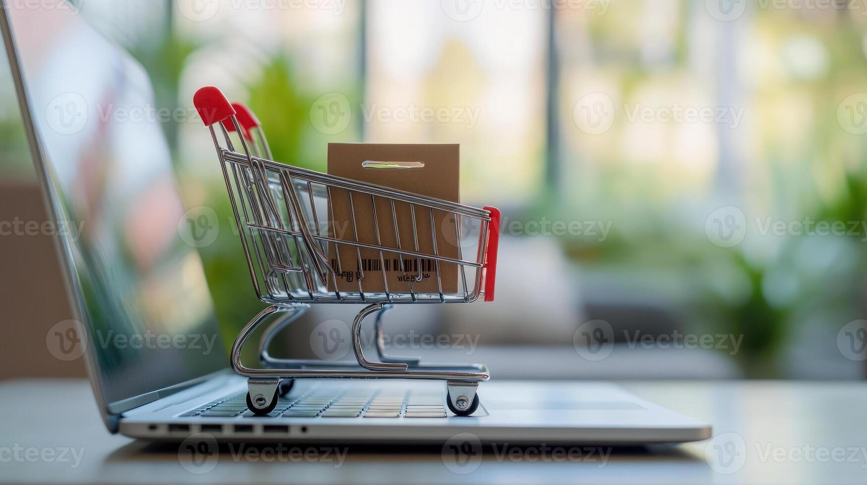 Close Up View of a Laptop with a Shopping Cart photo