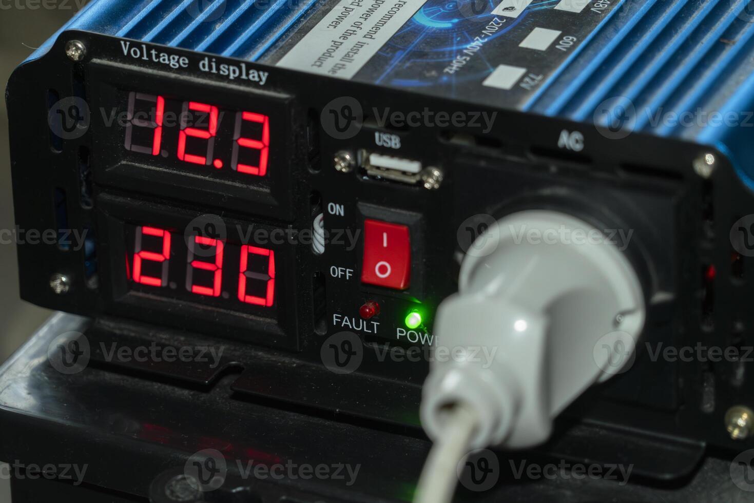 Voltage display device shows power levels and connection status photo