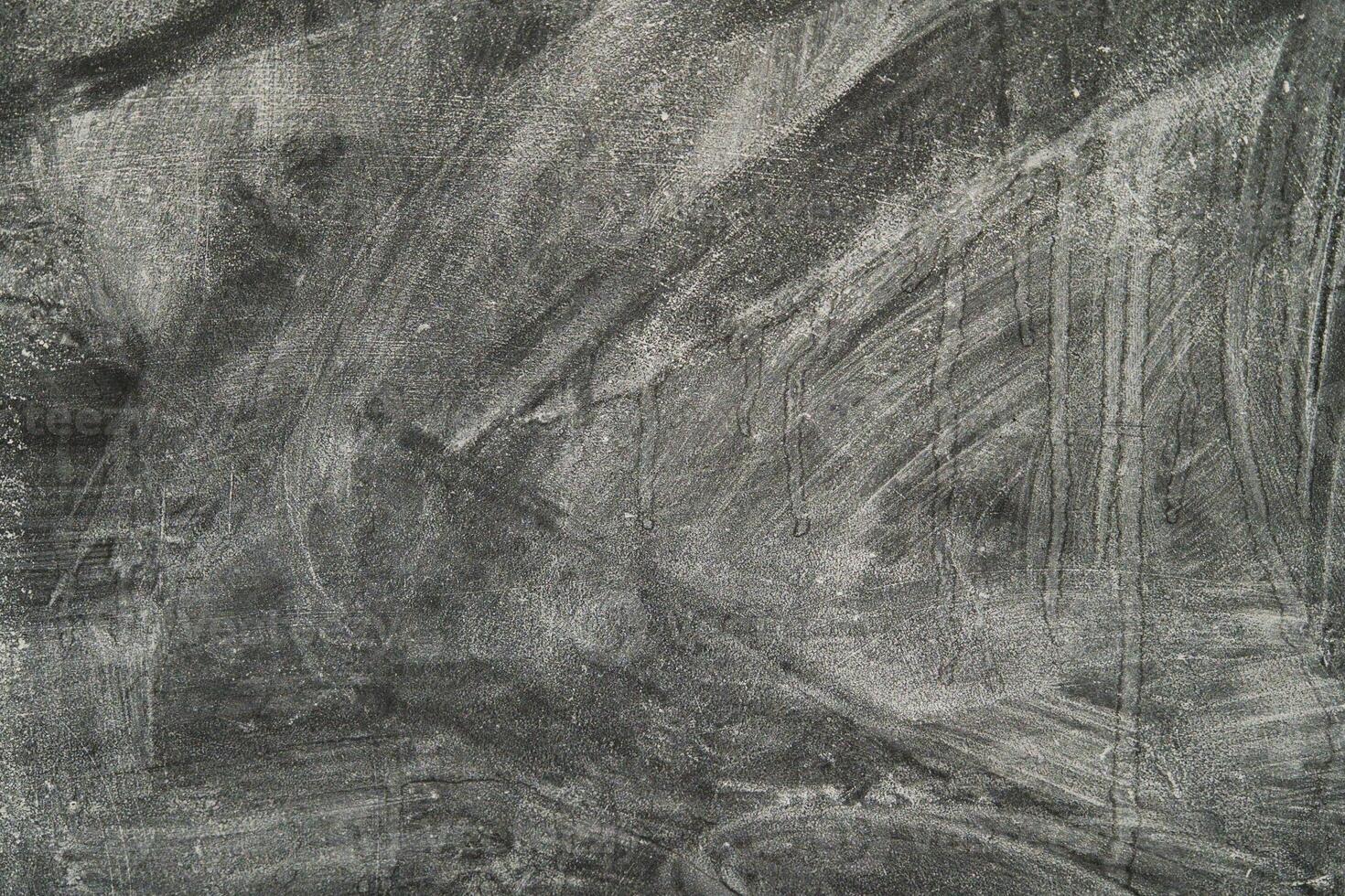 Abstract texture of gray surface with swirling patterns and depth photo