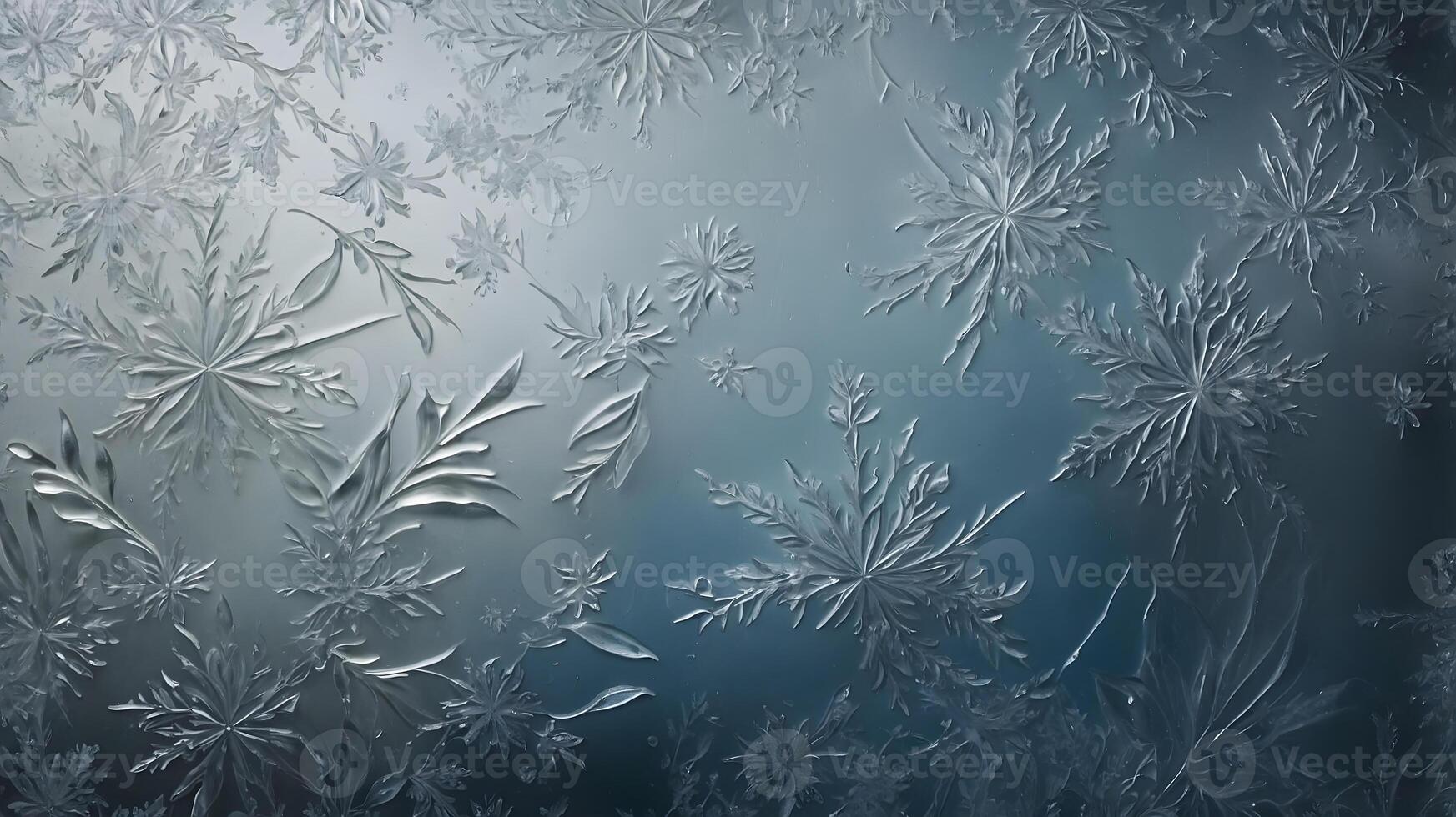 A frosted glass window with snowflakes on it photo