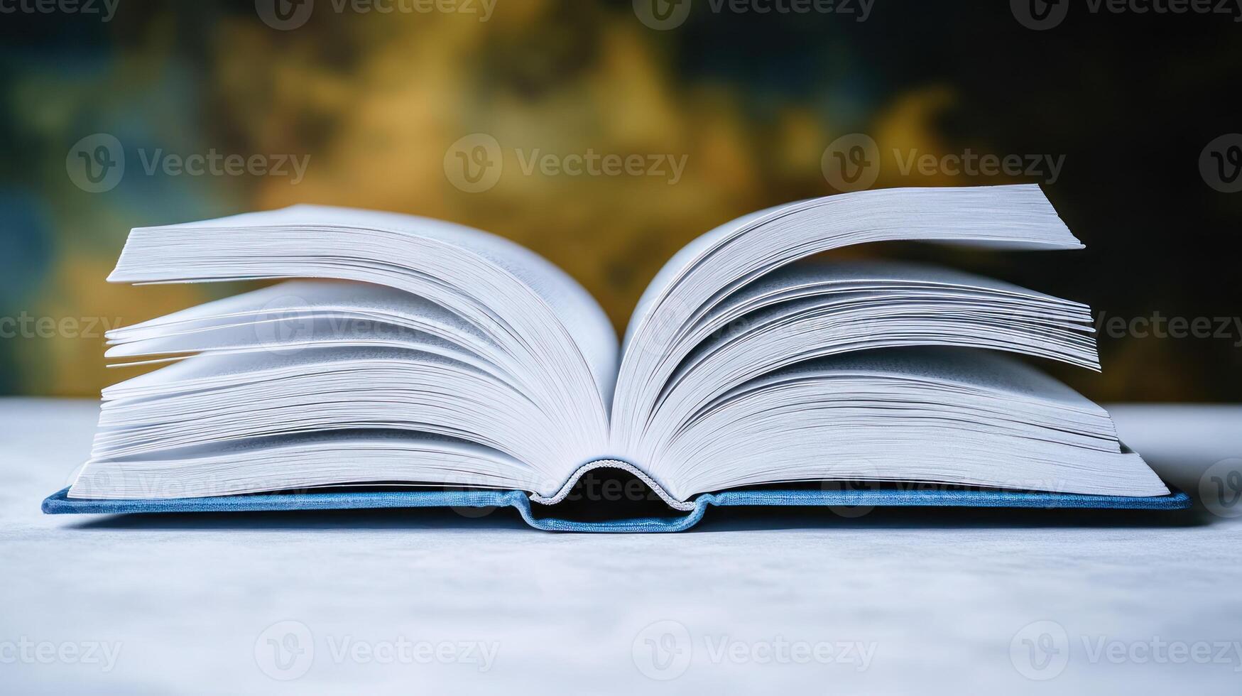 Soft light highlights an open book, inviting exploration of its hidden tales photo