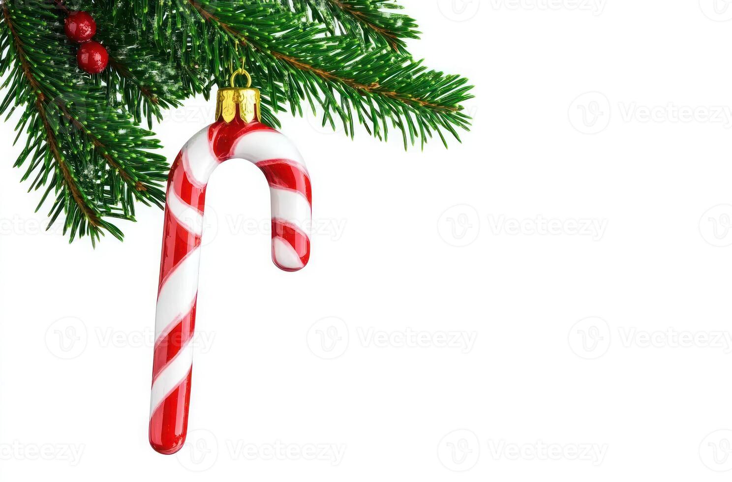 Christmas Candy Cane Ornament on Fir Branch Festive Holiday Decoration photo