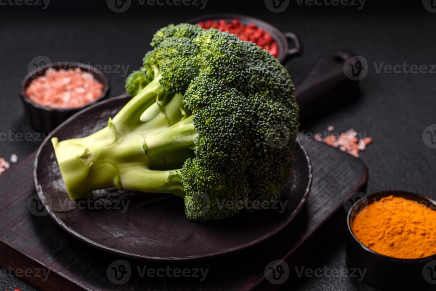 A sprig of raw green broccoli as an ingredient for a healthy meal photo