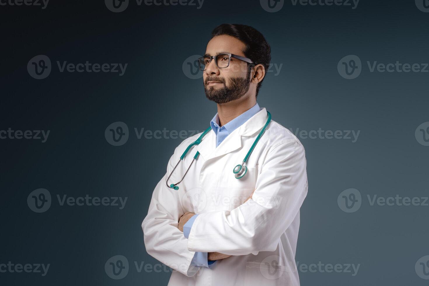 Portrait of serious, pensive Indian man, professional doctor wearing white coat, stylish eyeglasses photo