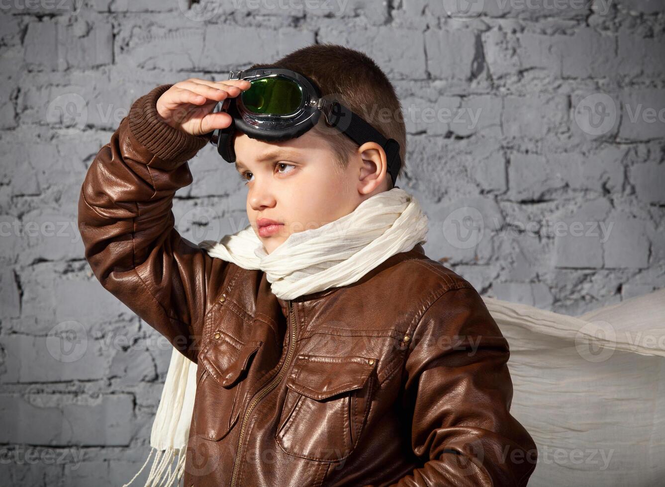 Little boy dreaming of becoming a pilot photo