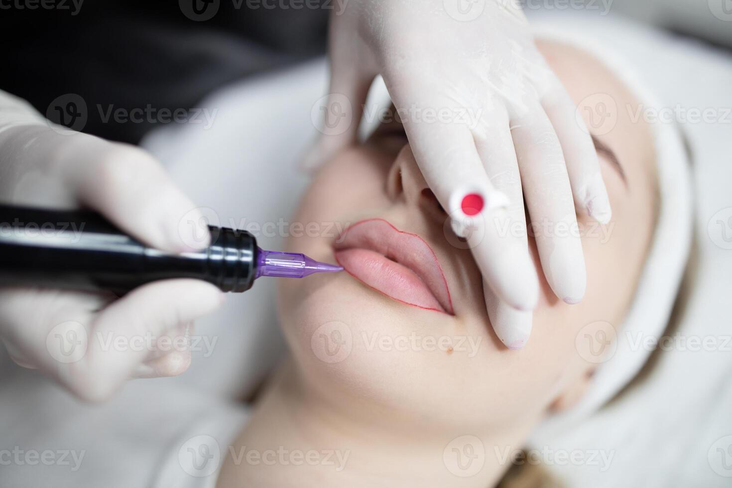 A beauty procedure session is taking place as woman relax in a salon environment. Trained professionals are applying permanent makeup to enhance their features, ensuring a long-lasting look. photo