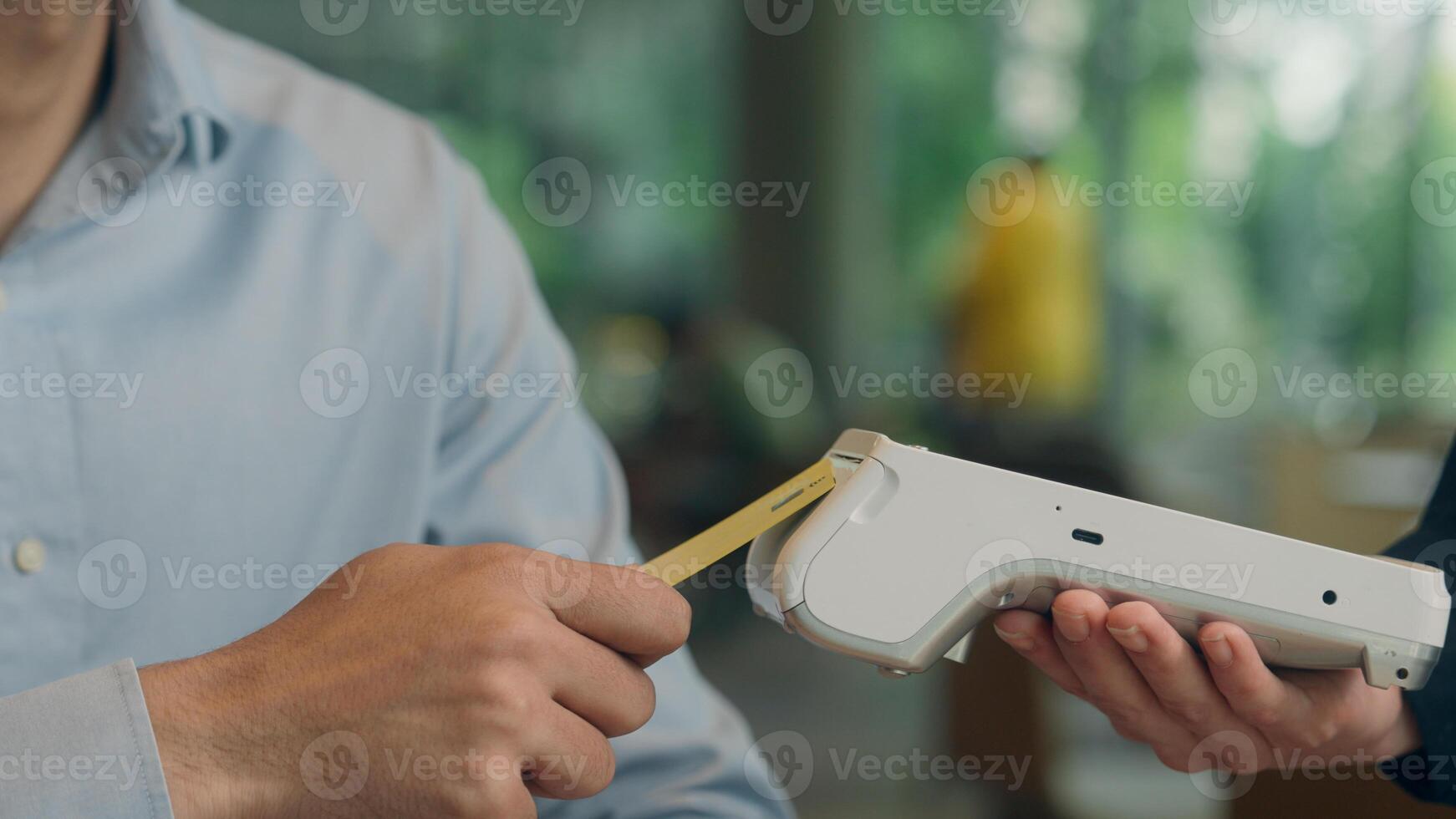 Customer pay food order lunch in cafe unrecognizable man contactless payment technology NFC on phone waiter serving visitor in restaurant male guy paying bank app mobile terminal scan cashless service photo
