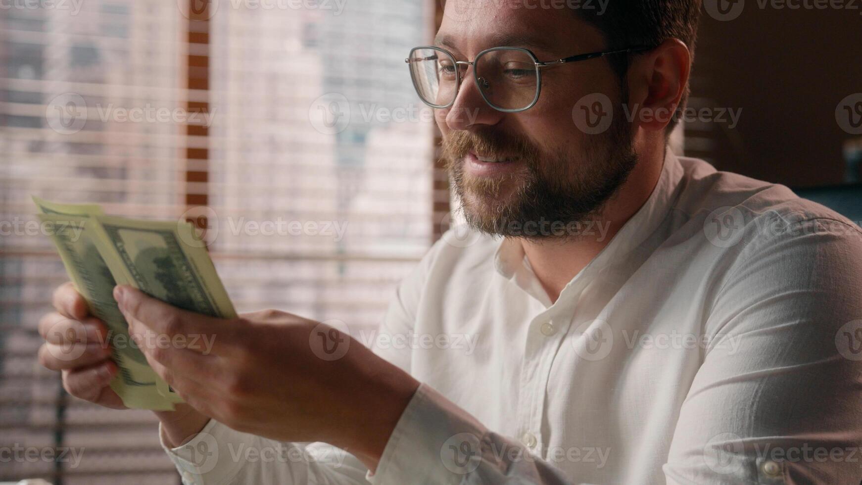Joyful Caucasian businessman guy trader executive boss counting money savings banknotes in office worker smile accountant male calculate company profit business man dollars cash wages salary earnings photo