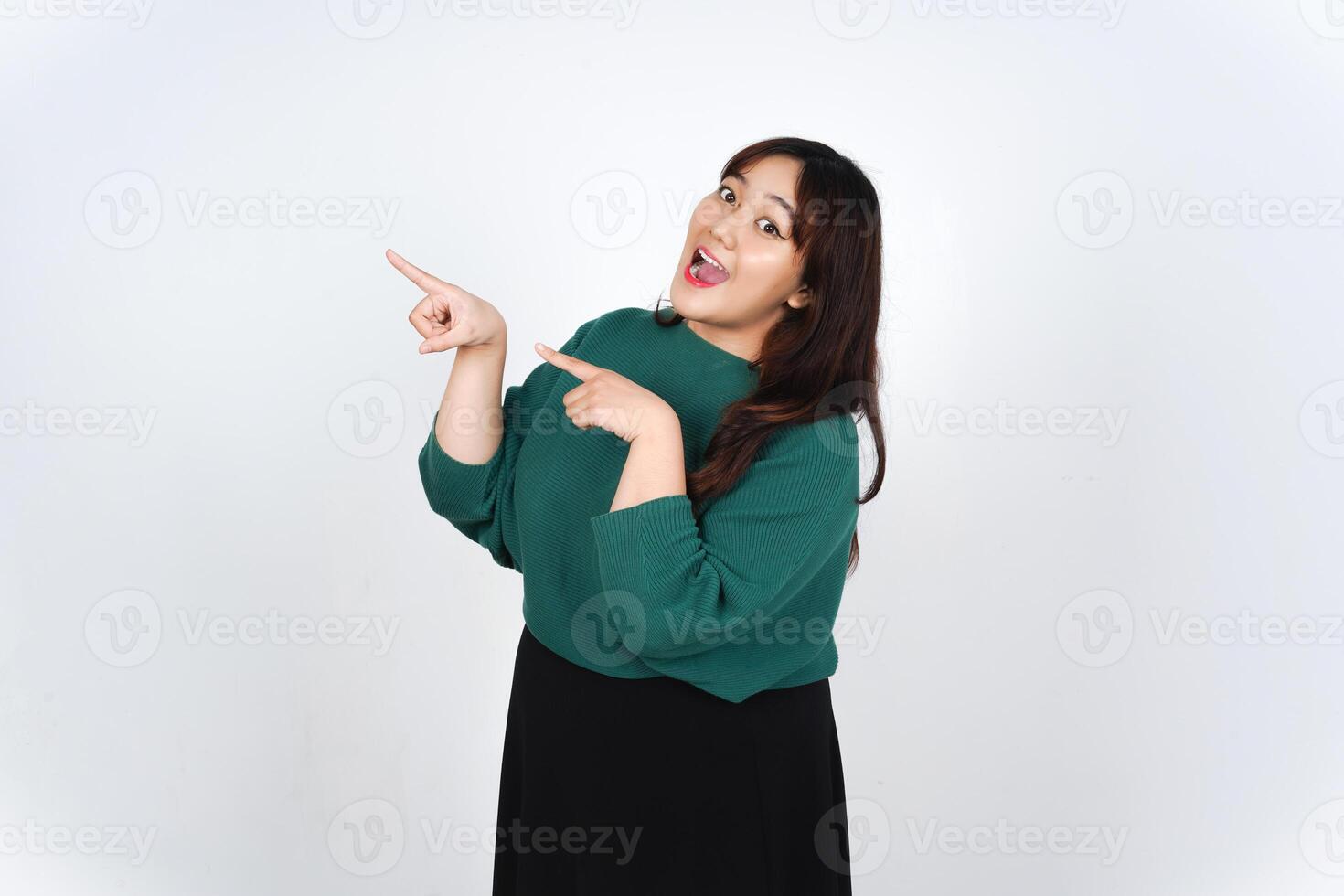 Smiling Presenting and Pointing aside at copy space for Advertising showing Product Of Beautiful Asian Woman Isolated On White Background photo