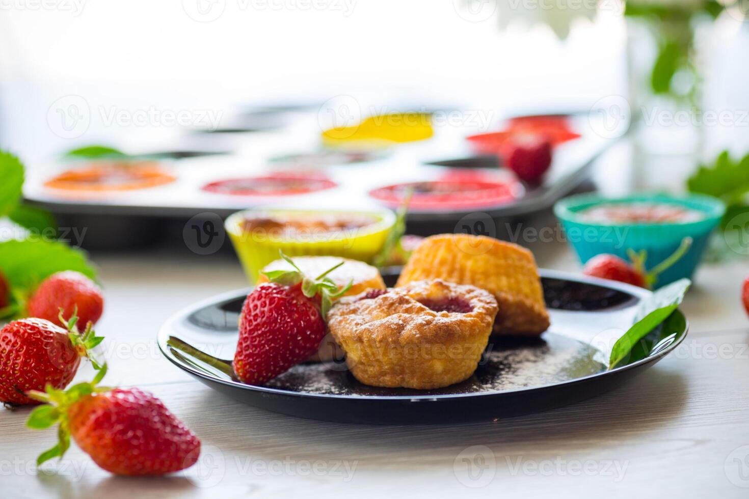 Sweet curd muffins with strawberry filling photo