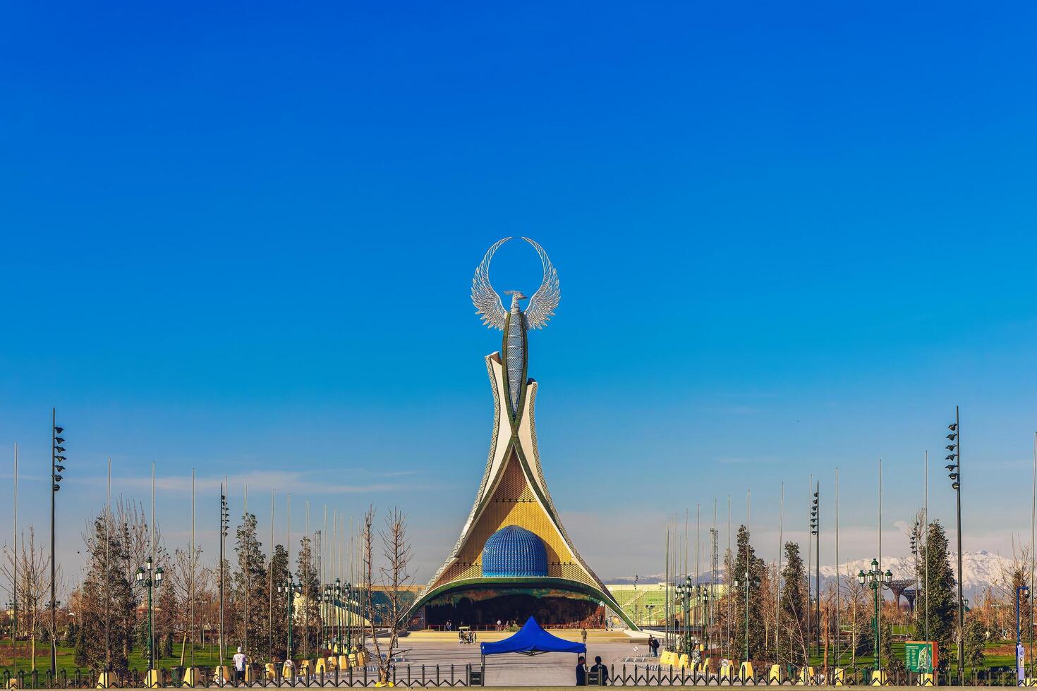Tashkent, Uzbekistan - March 23, 2024 Memorial of Freedom and Independence with the structure of the national color on the square of the city park New Uzbekistan- Yangi Uzbekistan photo