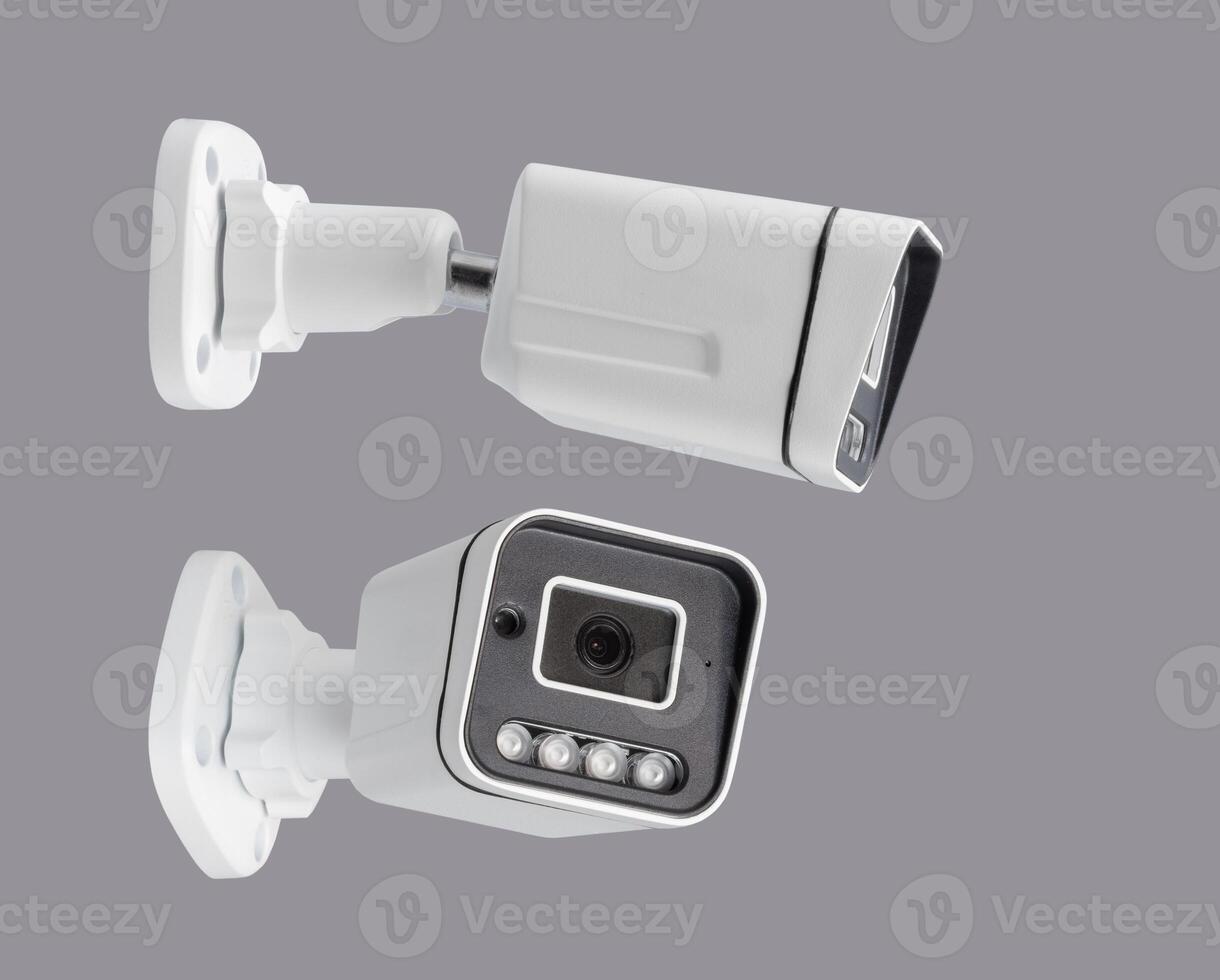 surveillance security camera isolated on gray background in different projections photo