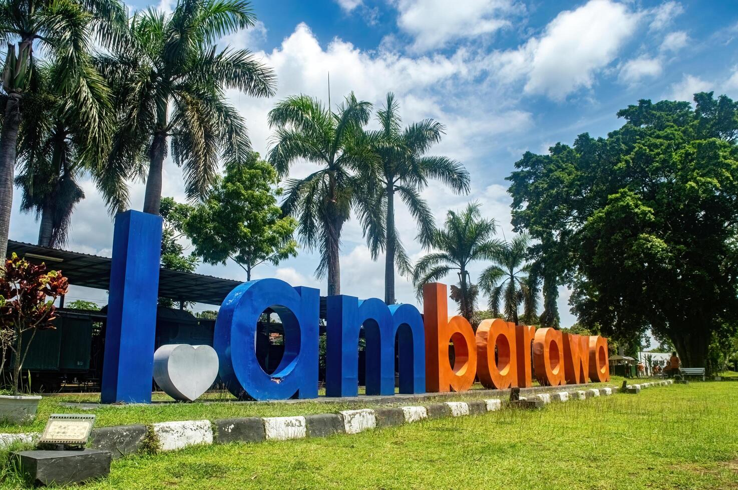 Ambarawa sign at the museum, a popular tourist spot in Central Java with palm trees and a clear sky. Indonesia, 17 November 2024 photo