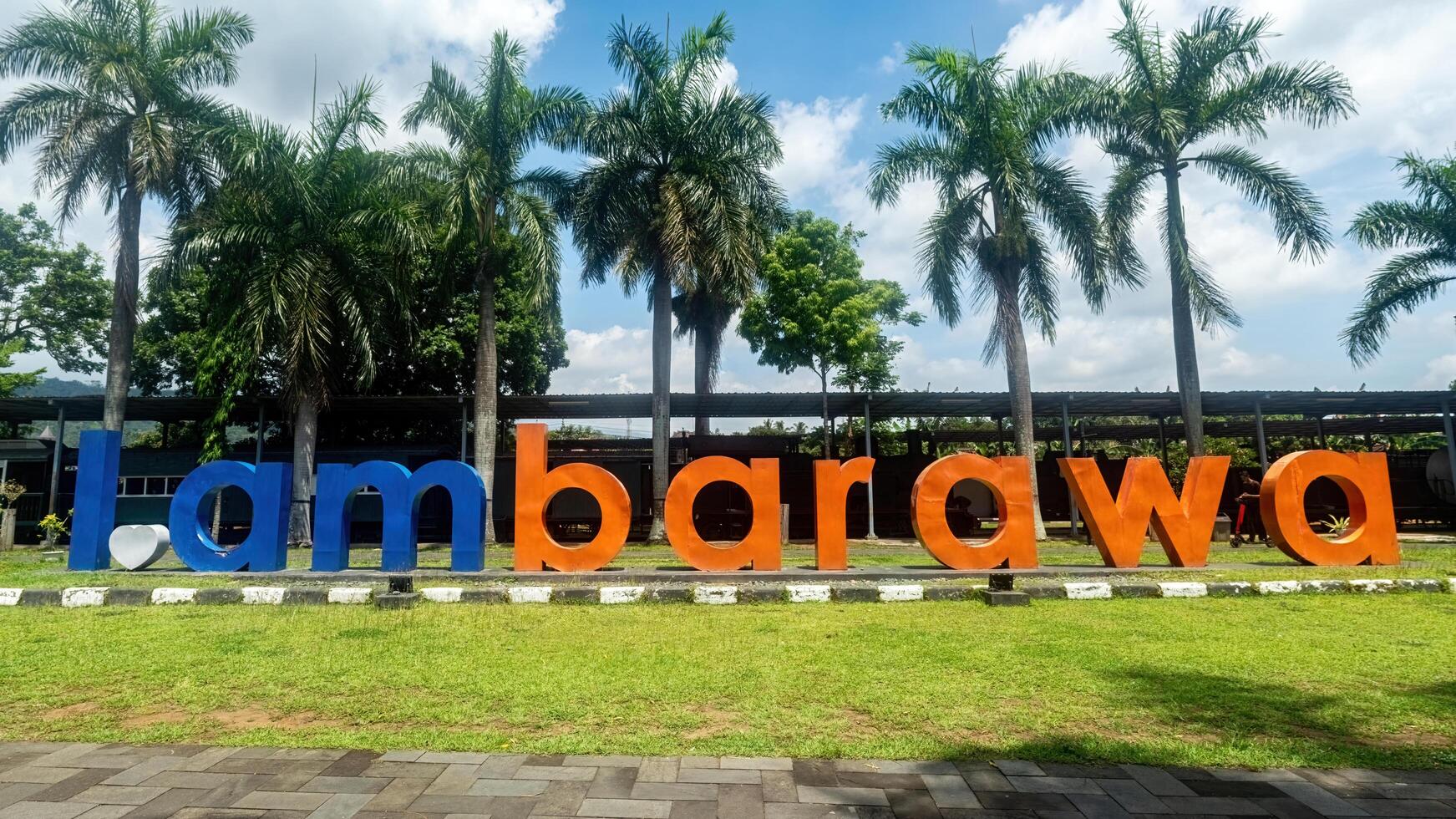 Ambarawa sign at the museum, a popular tourist spot in Central Java with palm trees and a clear sky. Indonesia, 17 November 2024 photo