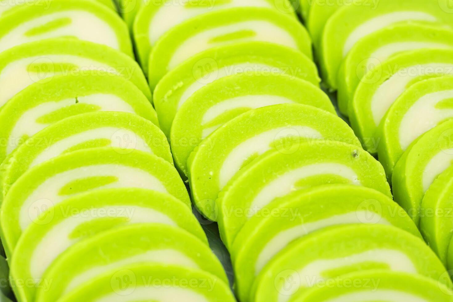 Lemon Sandesh texture closeup side view of Indian, pakistani and bangladeshi sweet dessert food photo