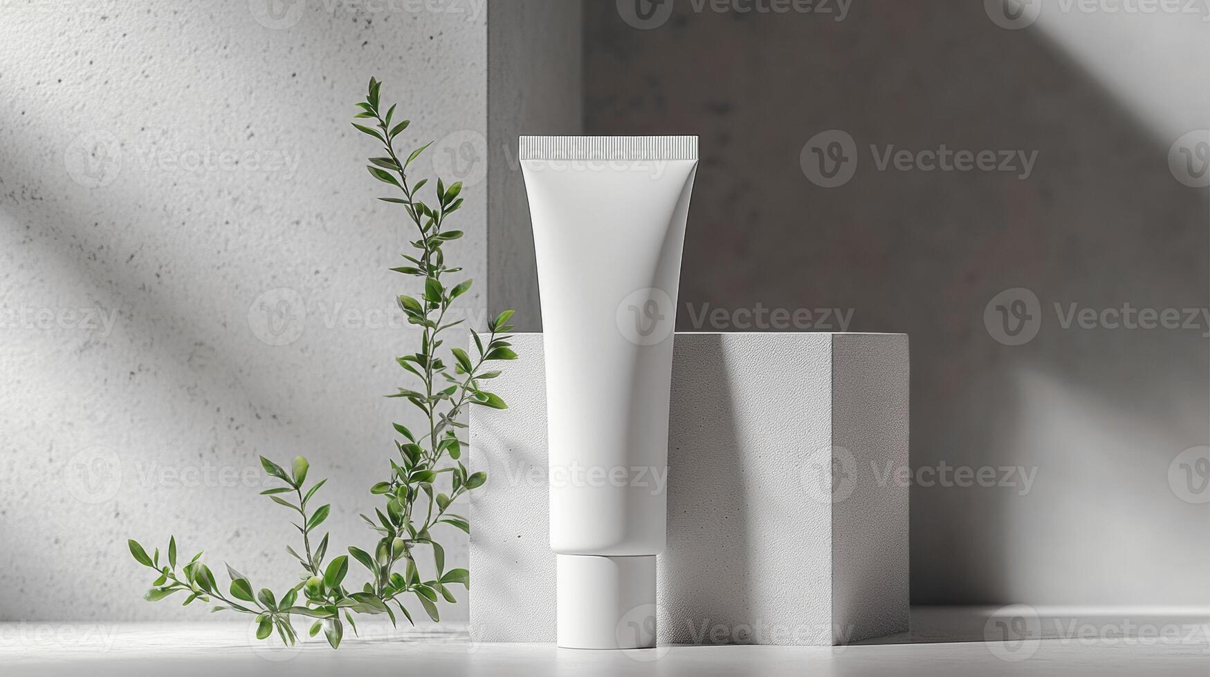 Mockup of cosmetic tube cream 50ml on concrete stone stand on gray background minimalist with green leaves. No branding, label template. Natural hard lighting and shadows photo